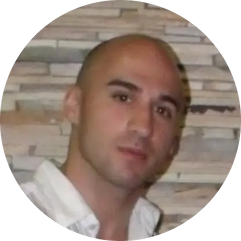 J.