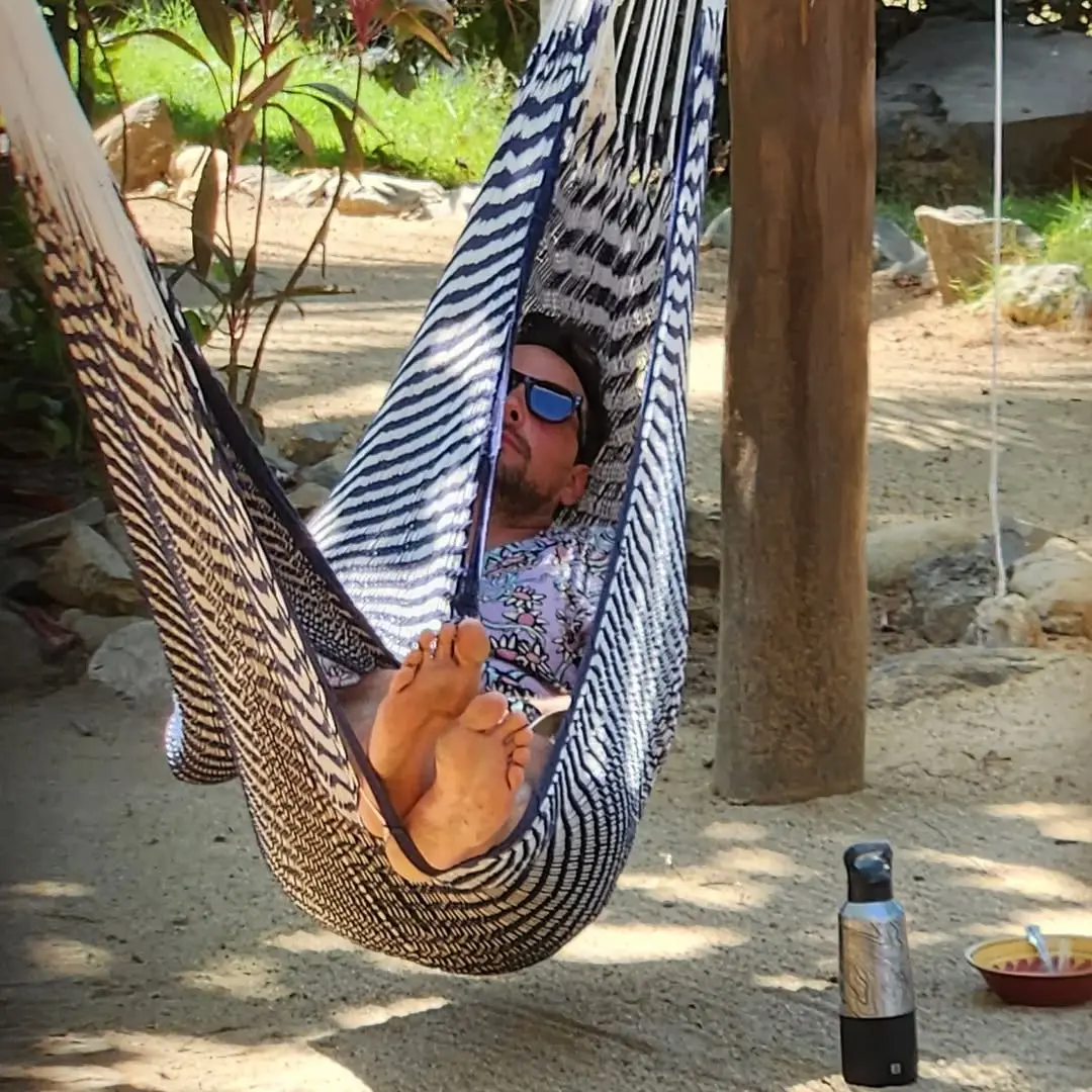 This isn’t laziness.

This is a highly strategic hangover management program conducted in optimal tropical conditions.

